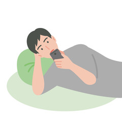 寝そべりながらスマートフォンを使う男性