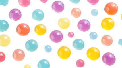 Flat lay of pastel colored gummy candy buttons and beads randomly arranged isolated