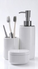 White ceramic bathroom set with soap dispenser and toothbrush holders