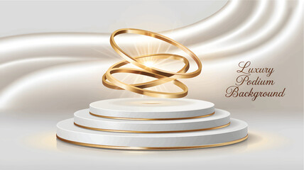 White tiered podium with gold rings and satin background