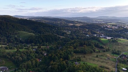 Fototapeta premium Stunning and Breathtaking Aerial View of Peaceful and Serene Rolling Hills with Lush Green Trees