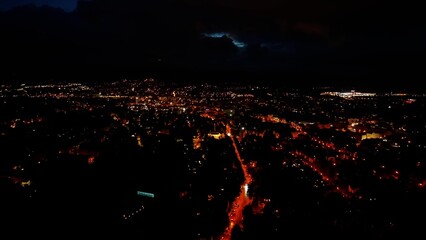 Experience the Stunning Aerial Night View of the Vibrant City Lights Illuminating the Skyline