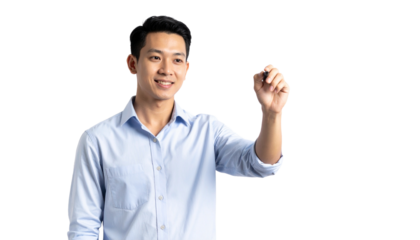 Young Asian man in a light blue button-down shirt writing with a pen on a white background