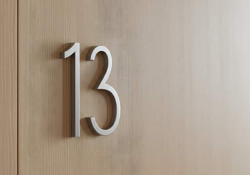 Number thirteen on wood surface symbol of numerology or sequence