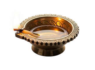 A traditional brass oil lamp with a lit candle inside, placed on a png transparent.
