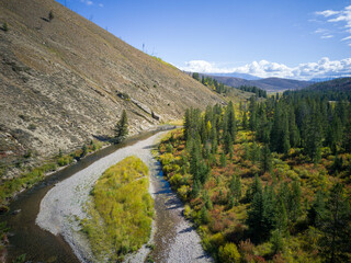 The river runs through a valley in Wyoming