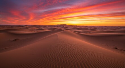 Dramatic desert sunset vivid sky over sand dunes, warm tones