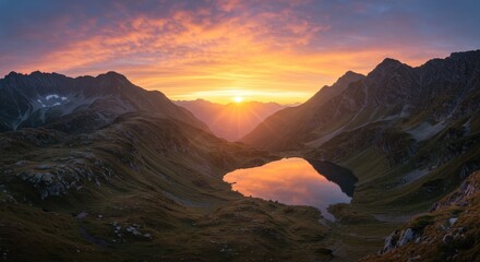 Majestic mountain lake reflecting fiery sunset colors, dramatic landscape scene