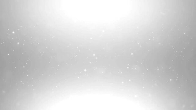 Soft white tiny particles floating slowly in smooth abstract background