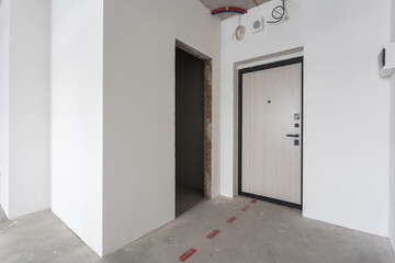 nterior of the apartment without decoration in gray colors