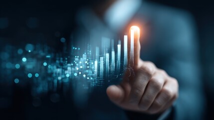Business professional using finger to touch glowing data visualization with increasing bars and digital effects in a futuristic office environment