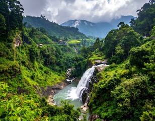 Lush mountain landscape with cascading waterfall amidst dense foliage