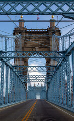 View of the road and structure inside the Roebling Suspension Bridge in Cincinnati Ohio.