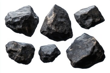 Set of six irregularly shaped black rocks with rough textured surfaces isolated on white background