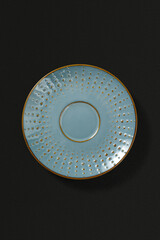 Ceramic plate on dark background