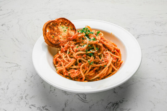 Spaghetti Marinara Tomato Sauce, Fresh Basil, Extra Virgin Olive Oil, and Parmesan