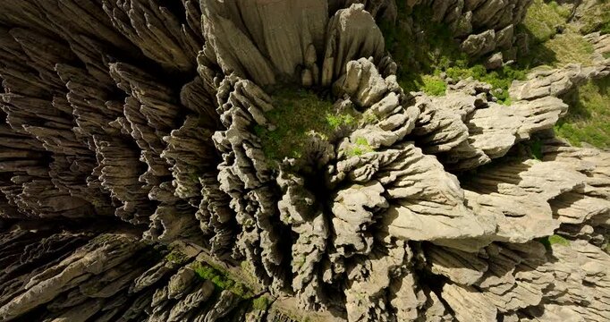 Rock formations in Valle de las Animas, Valley of the Souls, unique geological spires and abstract patterns near La Paz, Bolivia. Aerial top-down descending