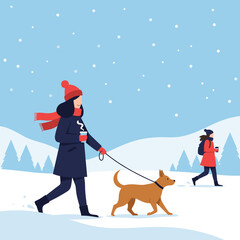 People and a dog enjoy a winter walk in the snow surrounded by pine trees.