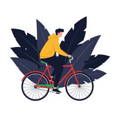 A person enjoys a leisurely bike ride through lush foliage.