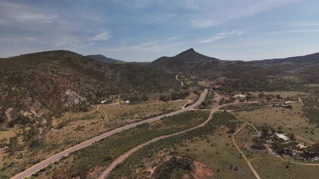Saltia, South Australia &ndash; 4K Aerial Drone Footage of Woolshed Flat Train Stop, Pichi Richi Railway, Outback Hills and Terrain, Winding Roads, Countryside, Rural Landscape near Quorn, Flinders Ranges