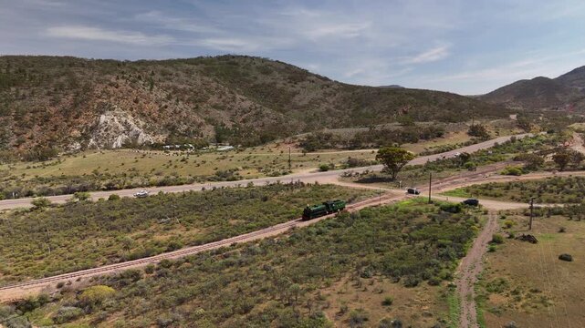 Saltia, South Australia &ndash; 4K Aerial Drone Footage of Woolshed Flat Train Stop, Pichi Richi Railway, Outback Hills and Terrain, Winding Roads, Countryside, Rural Landscape near Quorn, Flinders Ranges