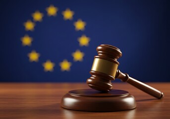 Wooden gavel and block resting on a desk, symbolizing law and justice in the context of the European Union flag