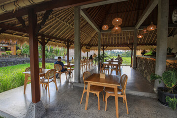 Restaurant with a lot of tables and chairs