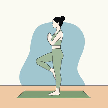 A woman practices yoga balance pose on a mat, focusing on mindfulness and inner peace.