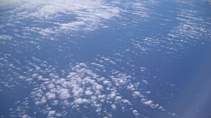 Clouds floating in clean blue sky