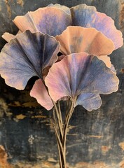 Painted ginkgo leaves in faded, pastel hues