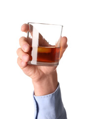 Male hand holding glass of rum on white background