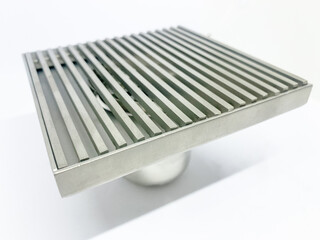 
That image shows a modern square floor drain cover or grate.

Here is an optimized title and a comprehensive list of keywords for microstock marketplaces:

Suggested Title
Modern Stainless Steel Squa