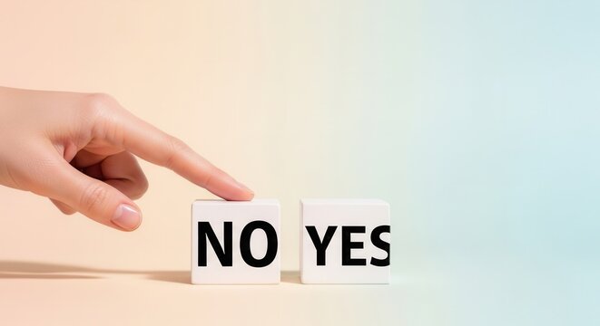 A human hands finger points at a white cube labeled NO next to another cube labeled YES against a gradient background