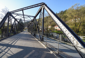 Metal bridge next to the Schiltach Church in Germany