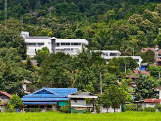 Umphang Hospital building, rice fields, houses, Umphang District, Tak Province