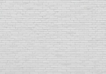 Fototapeta premium Clean white brick wall texture offers a modern, minimalist backdrop perfect for creative projects and urban designs