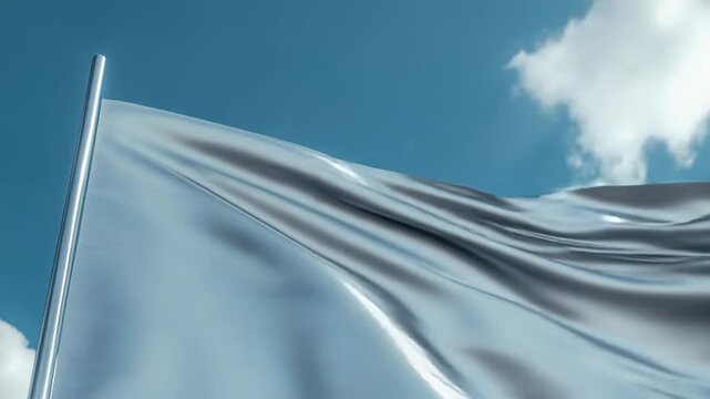 White flag waving on flagpole under blue sky