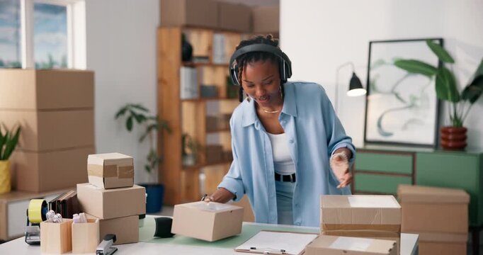 Woman, headphones and dancing with box for startup, streaming podcast and checklist for online order. Person, reading and information for shipping, supply chain or listening to music for distribution