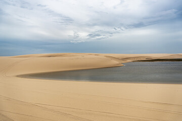 Dunes and lagoons of Atins, Lencois Maranhenses, Barreirinhas, Brazil. White sand dunes with pools of fresh water
