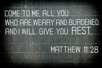 The Bible verse Matthew 11:28. The text reads: 