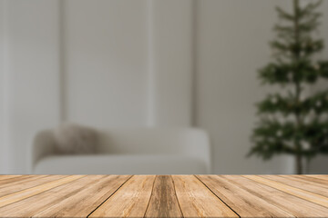 Wood table top on blur with bokeh christmas tree background - can be used for display or montage your products.