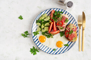 Continental Breakfast with Fried Eggs and Vegetables