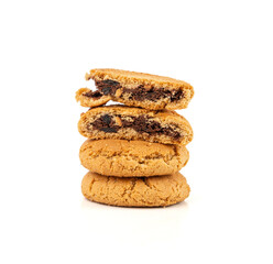 Chocolate cookies with chocolate filling isolated, brown round biscuits, broken sweet cocoa pastry