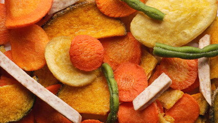 Assorted freeze dried vegetable chips with radish, carrot, potato, zucchini and beans
