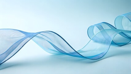 Obraz premium Elegant blue ribbon flowing gracefully creates a modern abstract design on light blue background
