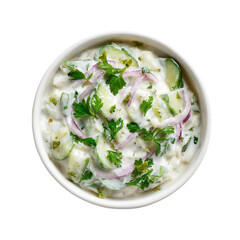 Creamy yogurt dip with cucumber onion and parsley on transparent background