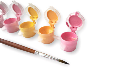 Set of pastel paints and a paintbrush on a white background. Perfect for art projects, creative, hobbies, and DIY crafts, for design or education themes