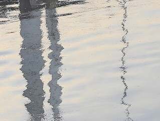 Abstract Water Reflection, Distorted Pillars in Calm Water