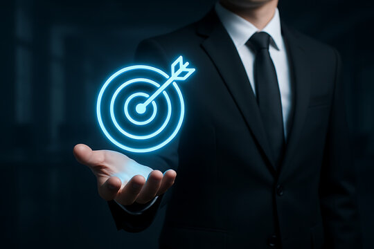Man in formal attire displaying a luminous blue target and arrow hovering over his palm concept of achieving business goals focus and successful digital strategy implementation