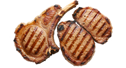 Photo Three Grilled Pork Chops Isolated on Black Background